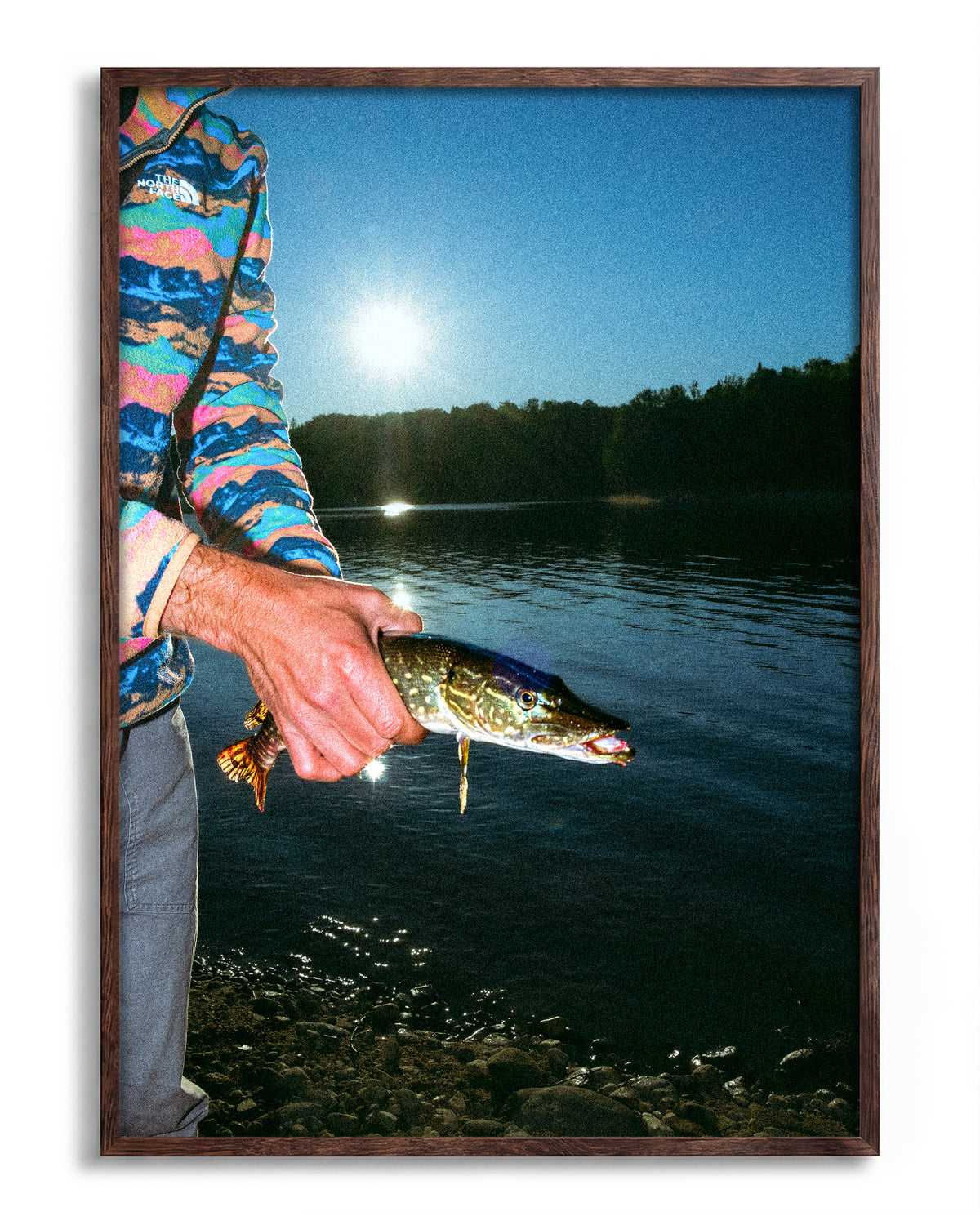 First Catch fishing photography print in a walnut frame