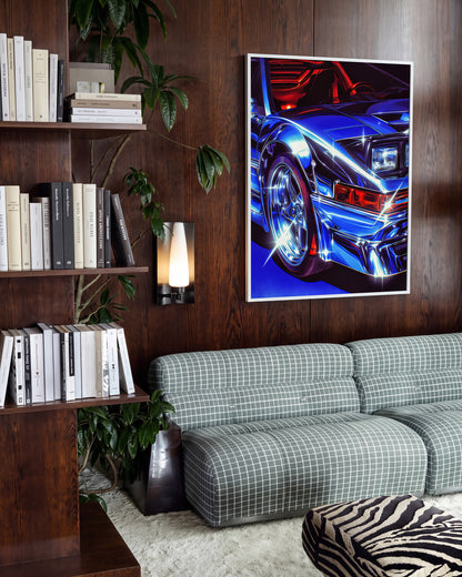 Chrome Ferrari supercar art print in a white frame on a room wall