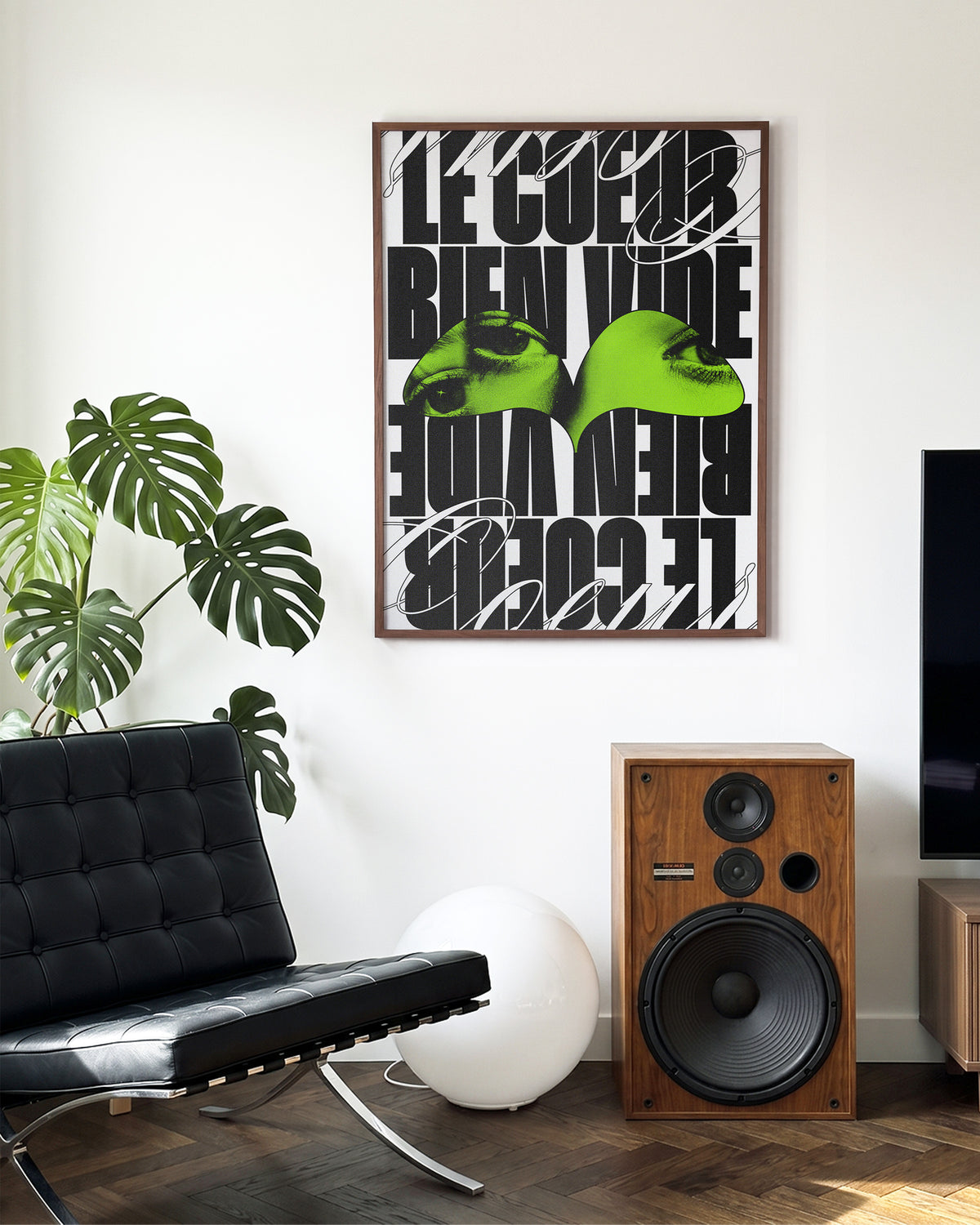 Le Cour Bien Vide French typography poster in a walnut frame on a room wall