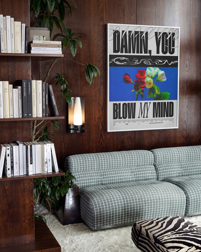 Blow My Mind floral quote poster in a white frame on a room wall