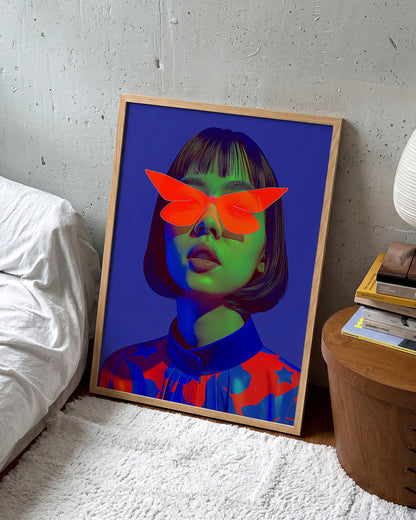 Butterfly Shades pop art portrait print in an oak frame on a room wall
