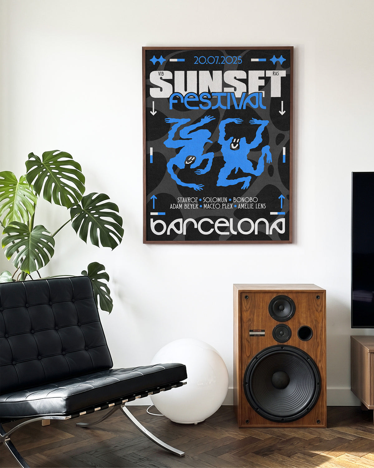 Blue Sunset Festival music festival poster in a walnut frame on a room wall