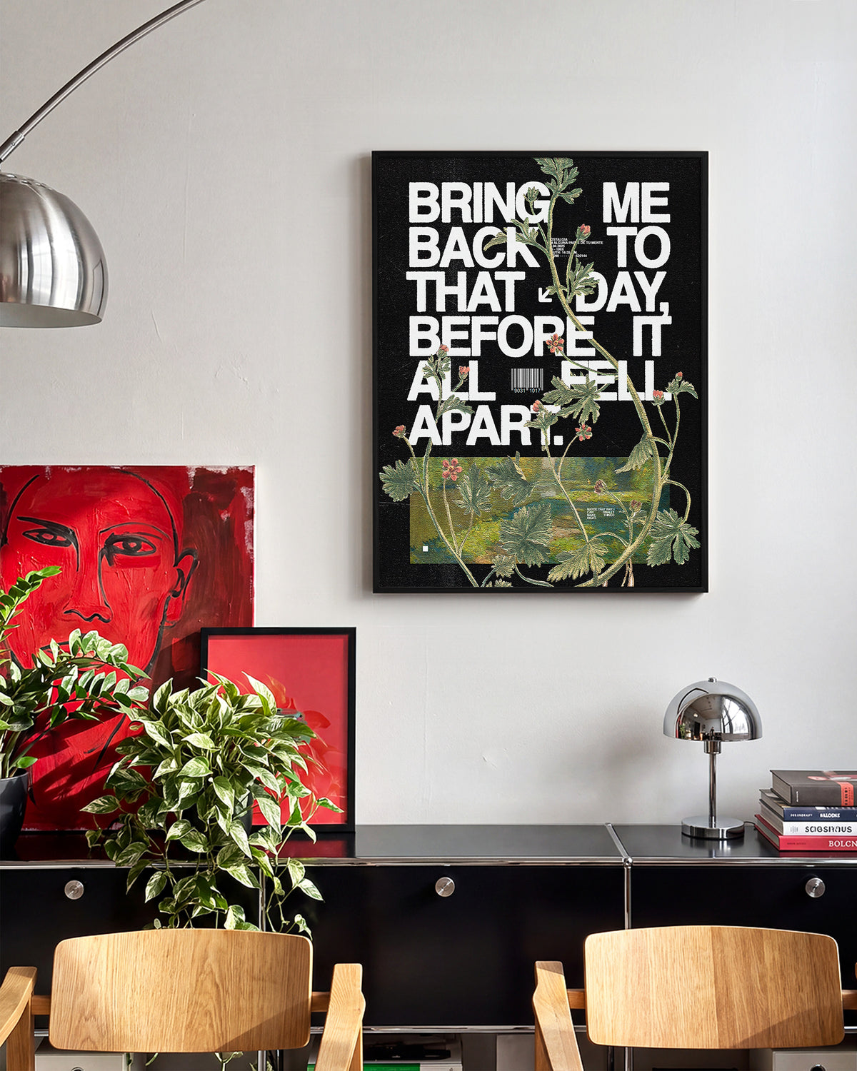Fell apart typography quote print in a black frame on a wall