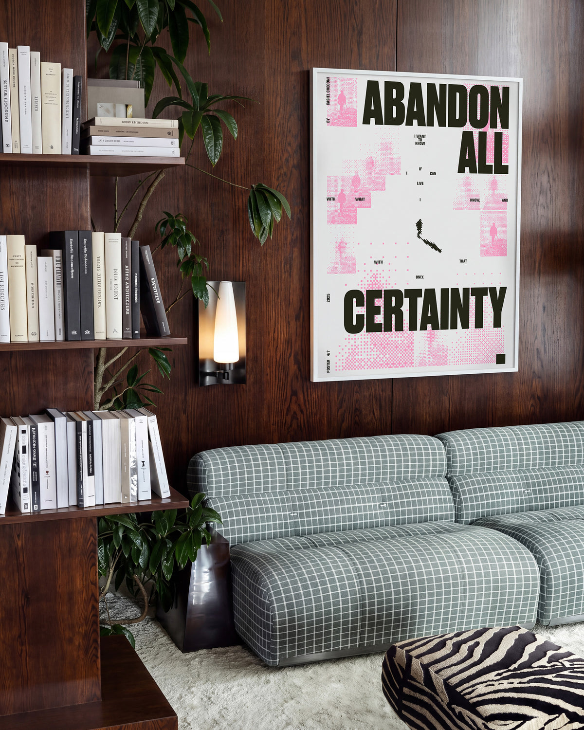 Abandon all certainty minimalist quote print in a white frame on a wall
