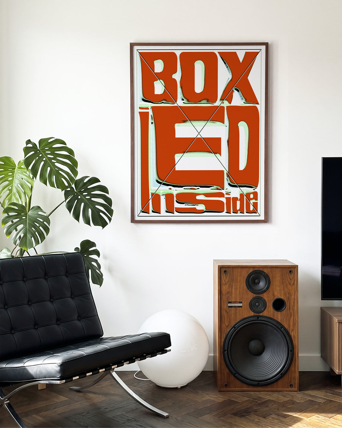 Boxed retro typography quote print in a walnut frame on a wall
