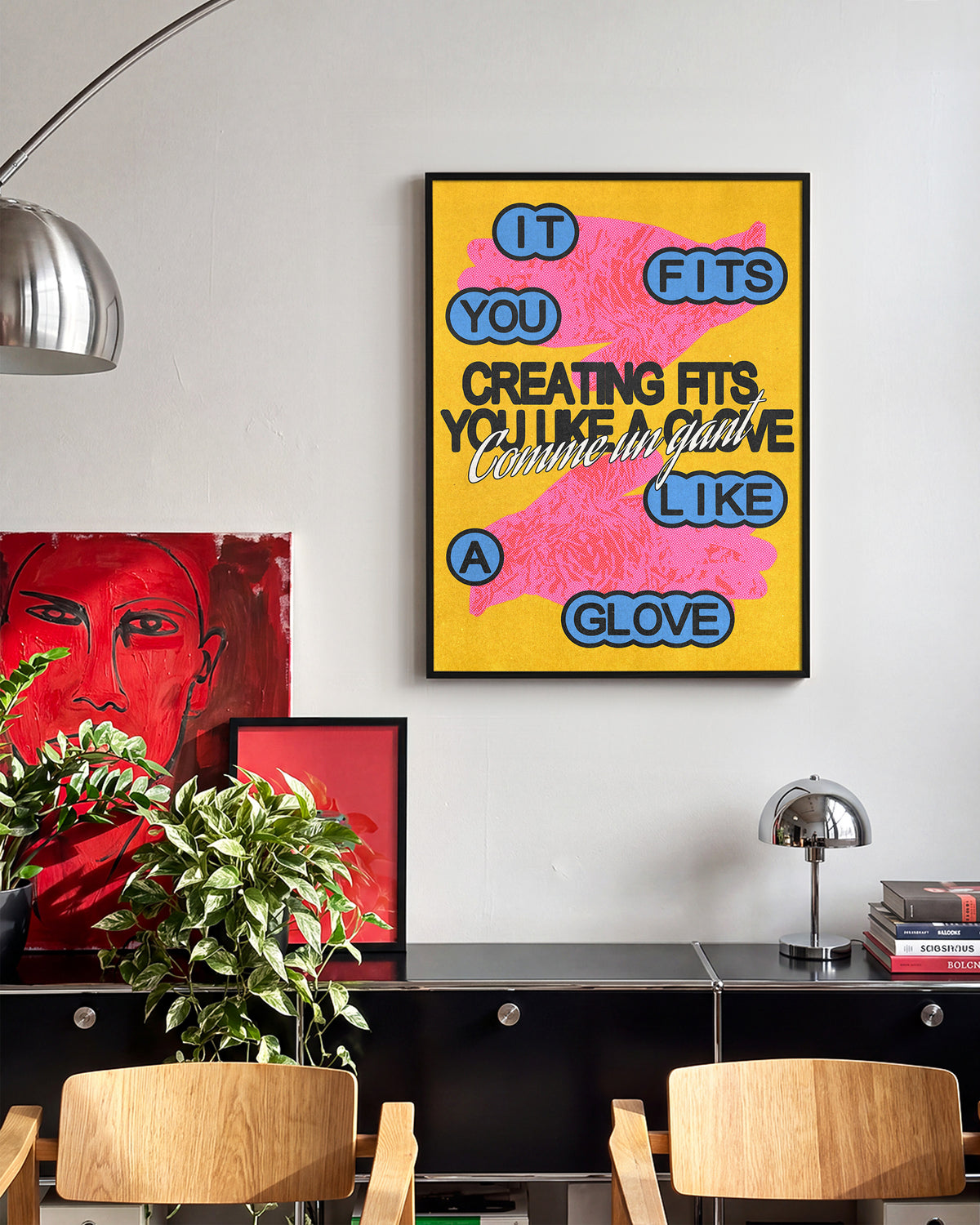 Comme un gant jaune French pop art print in a black frame on a wall