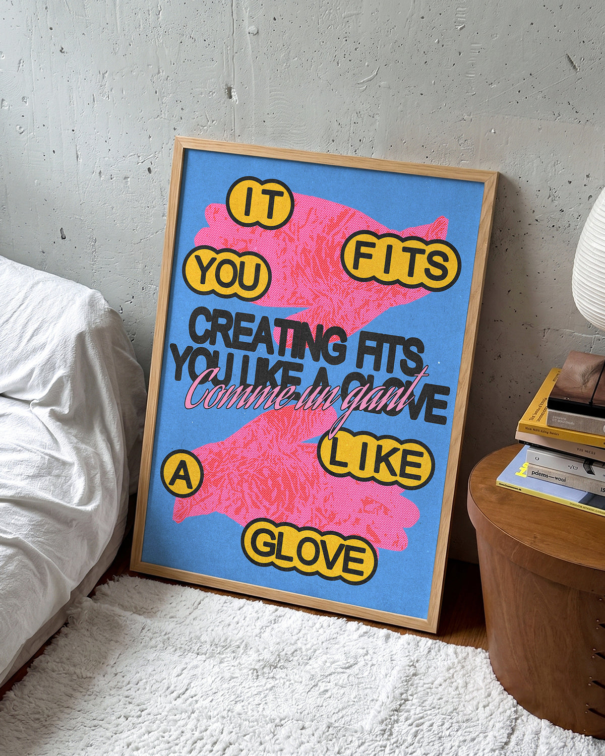 Comme un gant bleu French pop art print in an oak frame on a wall