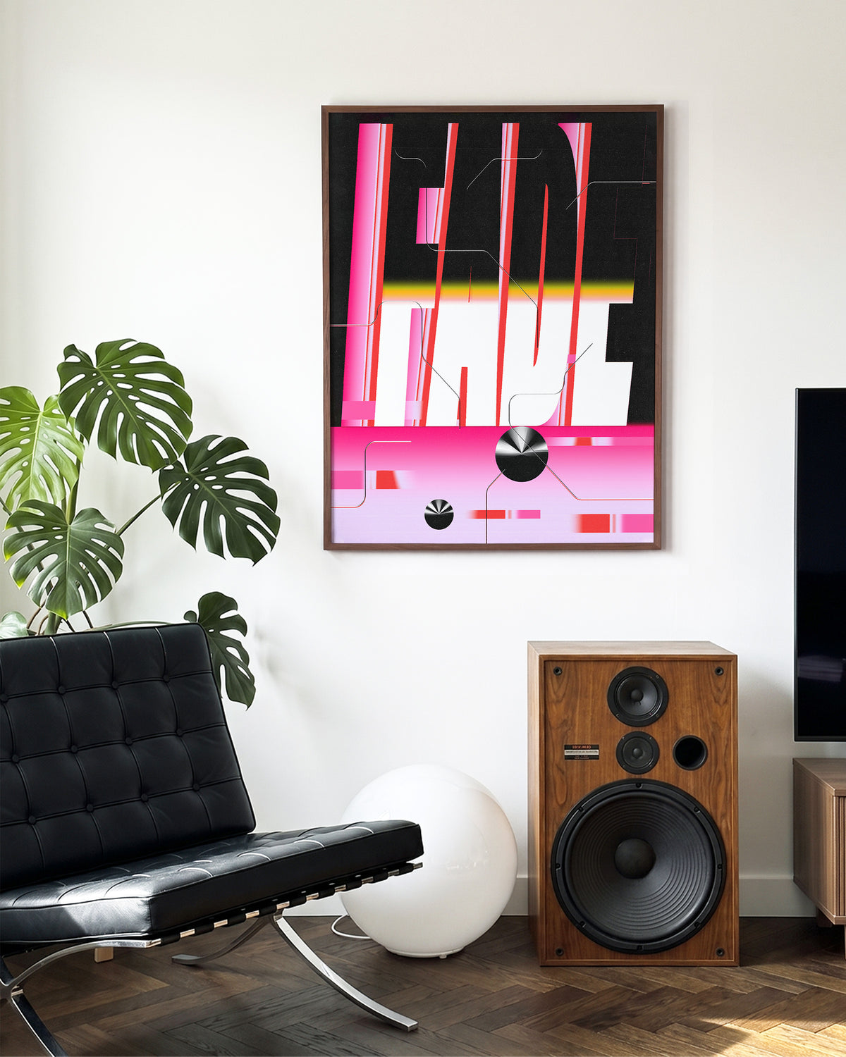 Fade retro typography poster in a walnut frame on a wall