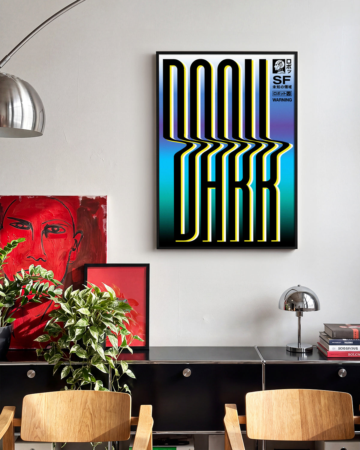 Dark Japanese abstract poster in a black frame on a wall