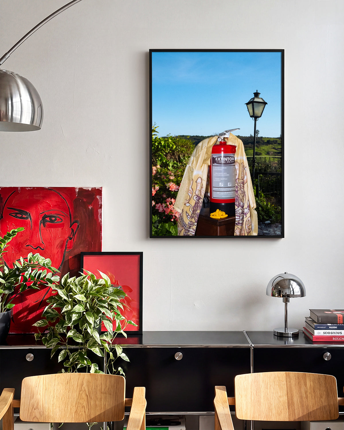 Fire photography art print in a black frame on a wall