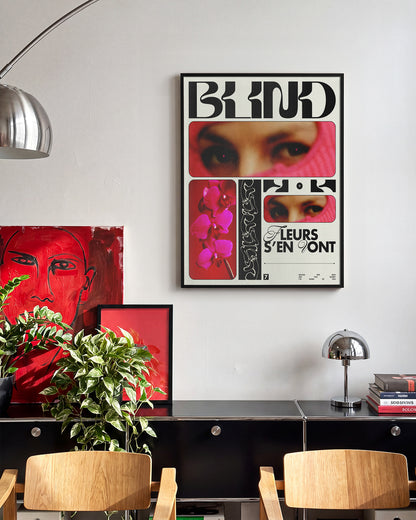 Blind typography graphic print in a black frame on a wall