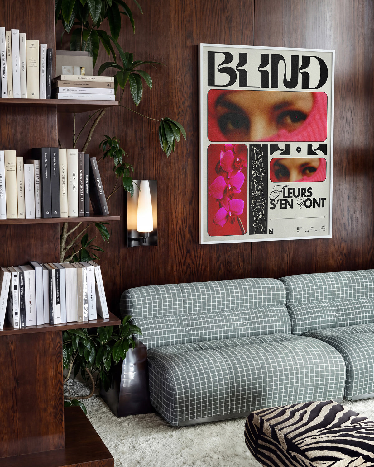 Blind typography graphic print in a white frame on a wall