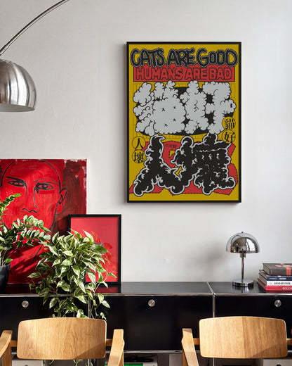 Cats are good cat quote poster in a black frame on a wall