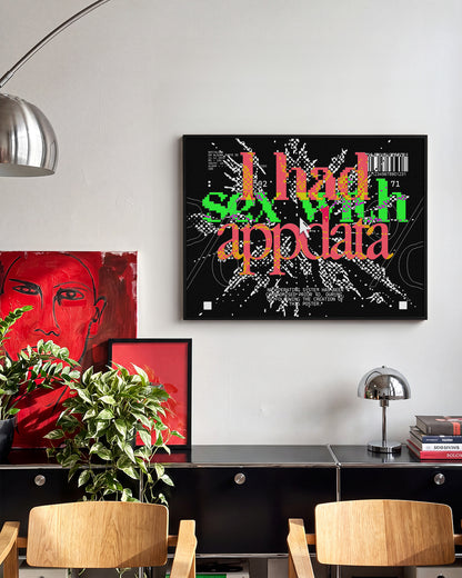 Appdata maximalist typography print in a black frame on a wall