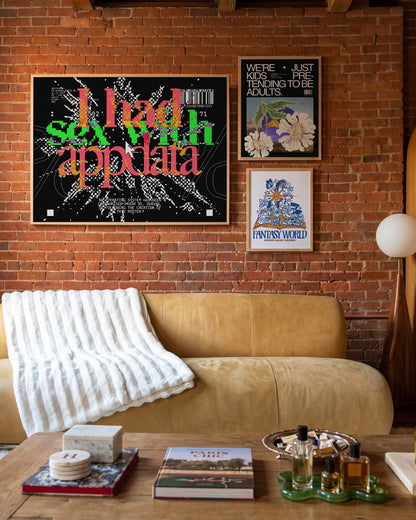 Appdata maximalist typography print in an oak frame on a wall