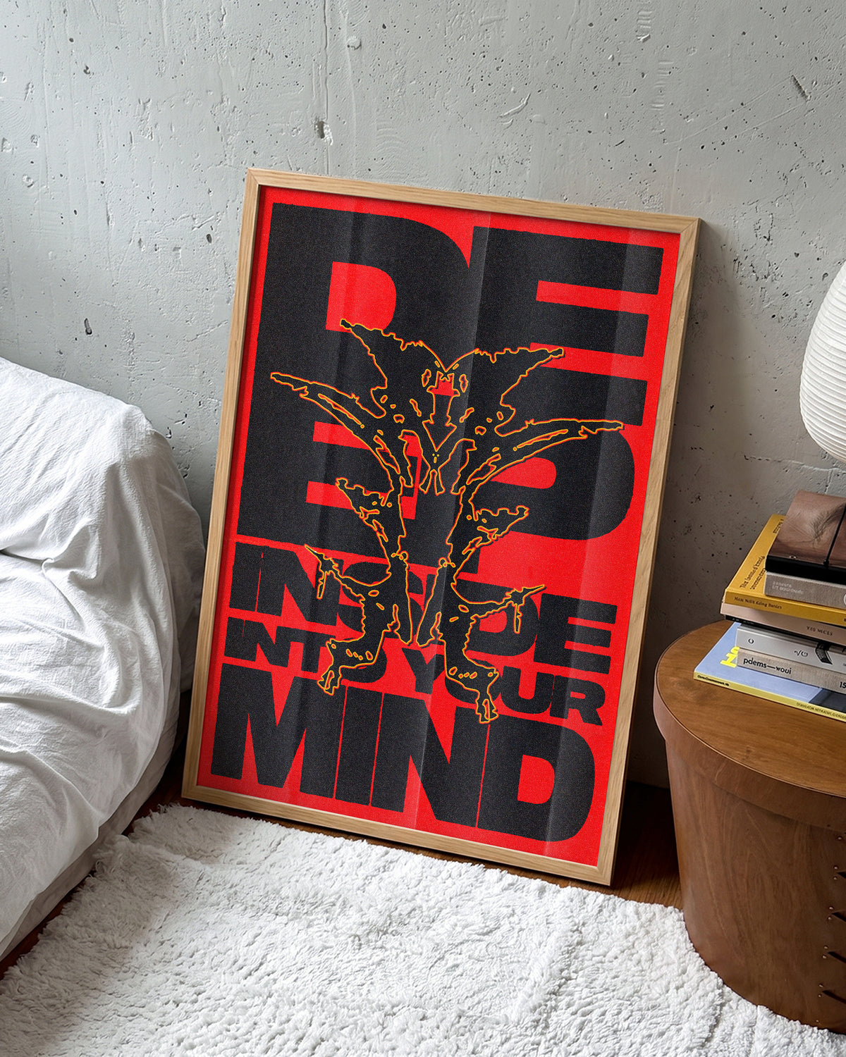 Deep typography quote poster in an oak frame on a wall