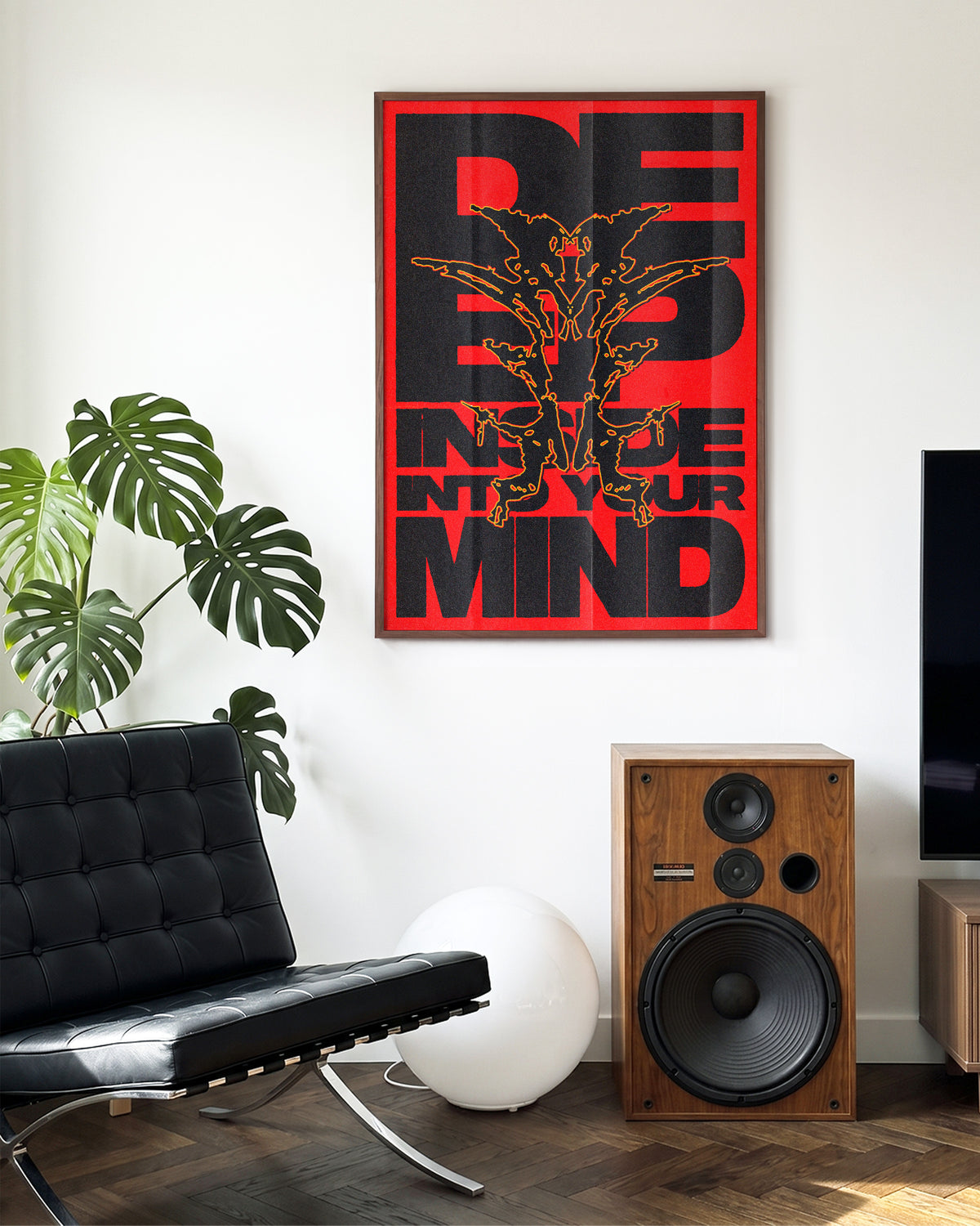 Deep typography quote poster in a walnut frame on a wall