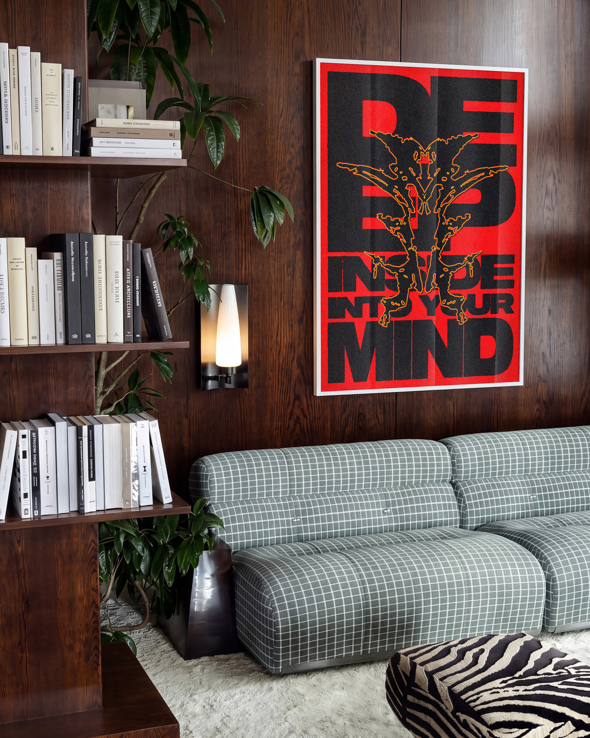 Deep typography quote poster in a white frame on a wall
