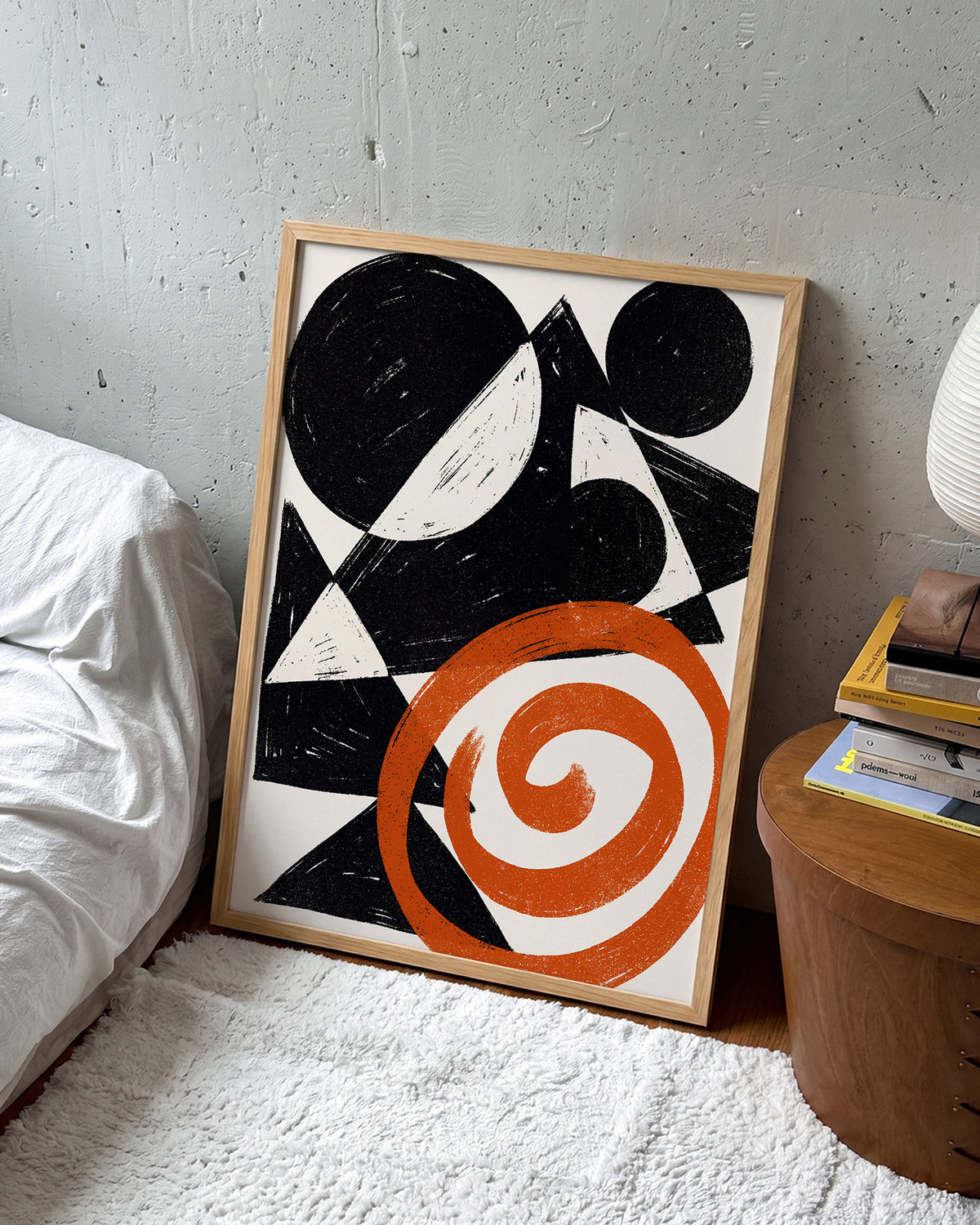 Ember Spiral abstract spiral art print in an oak frame on a wall