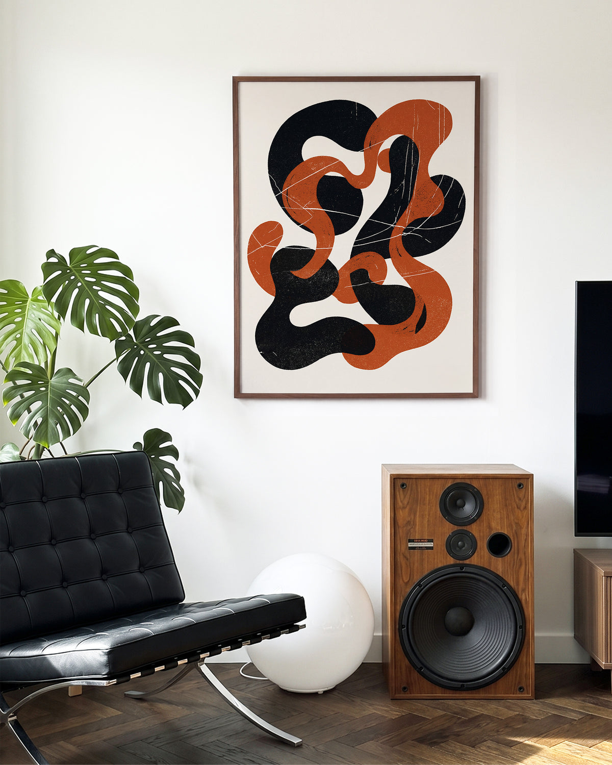 Cinder Flow abstract art print in a walnut frame on a wall