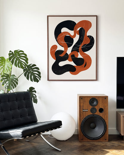 Cinder Flow abstract art print in a walnut frame on a wall