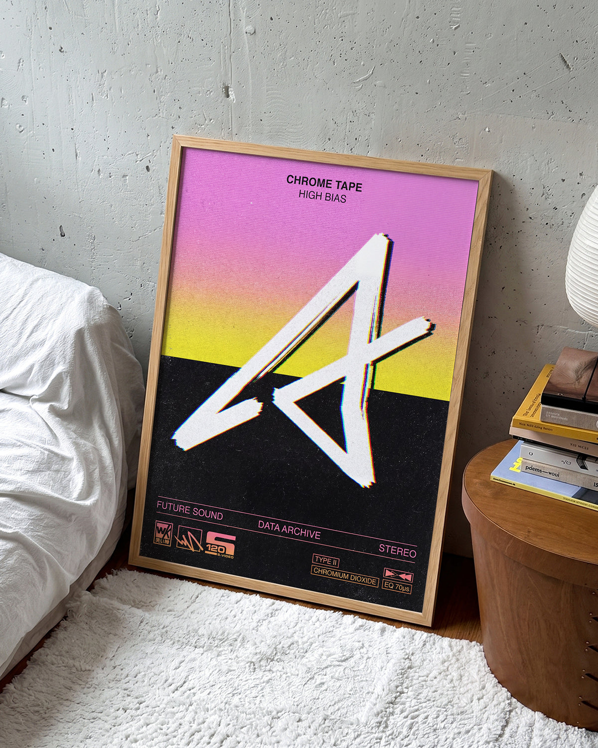 Chrome Tapes geometric typography poster in an oak frame on a wall