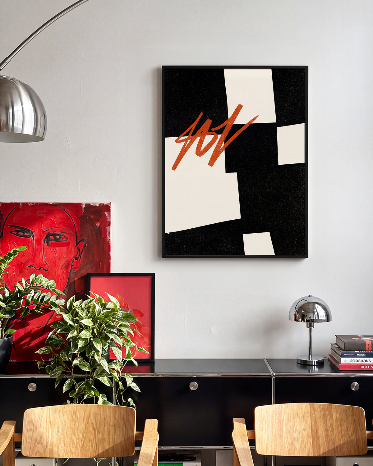 Blockout geometric abstract poster in a black frame on a wall