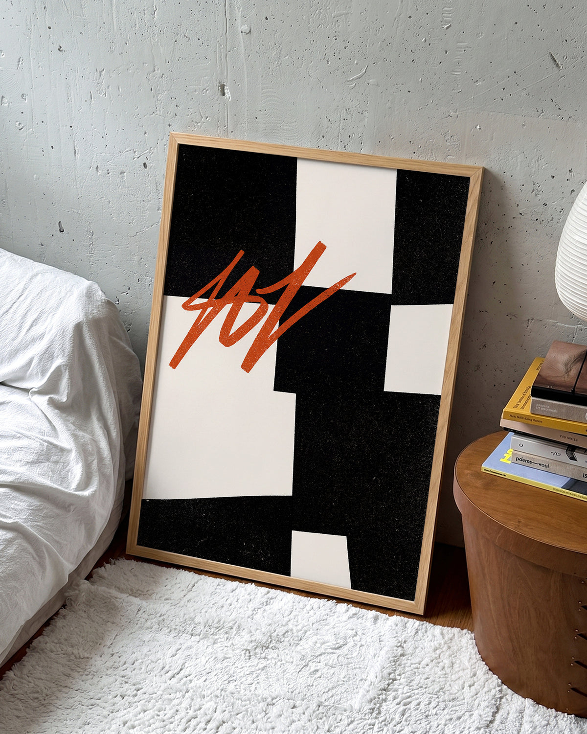 Blockout geometric abstract poster in an oak frame on a wall