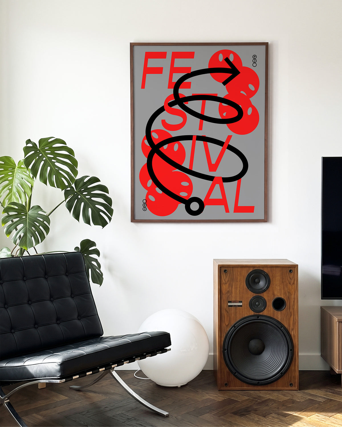Festival Jerome Bizien typography print in a walnut frame on a wall