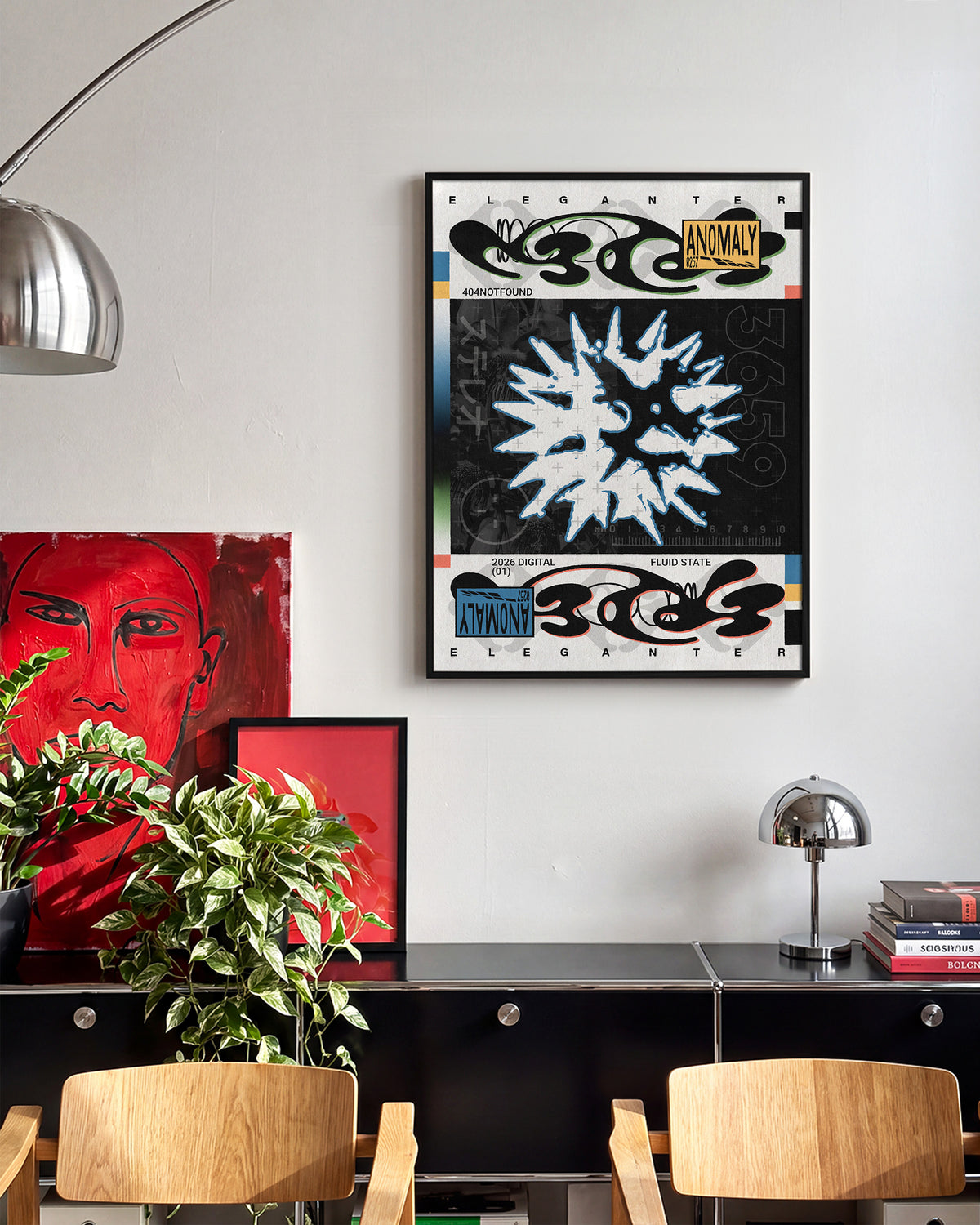 Anomaly abstract geometric typography print in a black frame on a wall