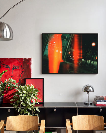 Ember moody night photography print in a black frame on a wall