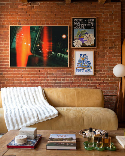 Ember moody night photography print in an oak frame on a wall