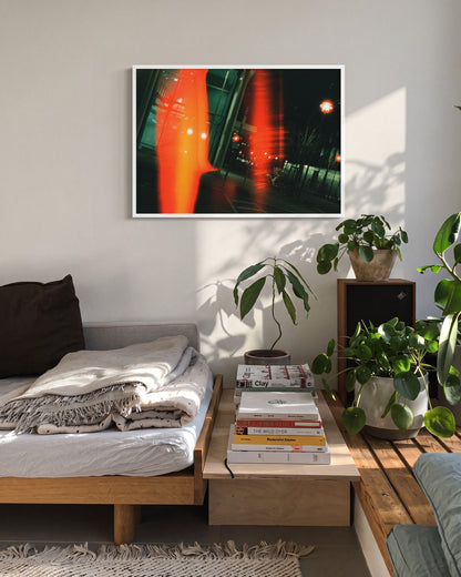 Ember moody night photography print in a white frame on a wall