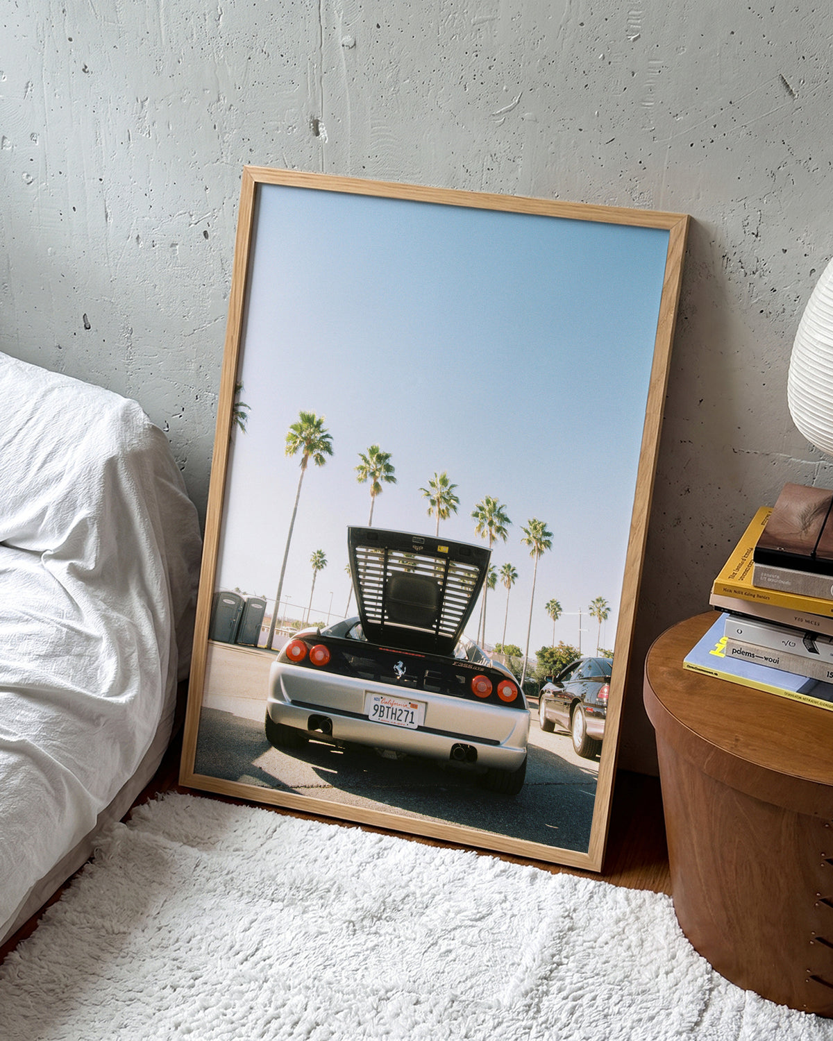Ferrari LA Los Angeles car photography print in an oak frame on a wall