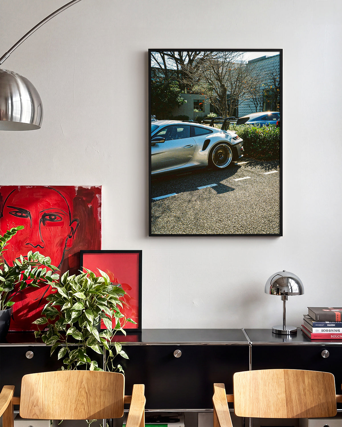 Andreezy 17 minimalist car photography print in a black frame on a wall