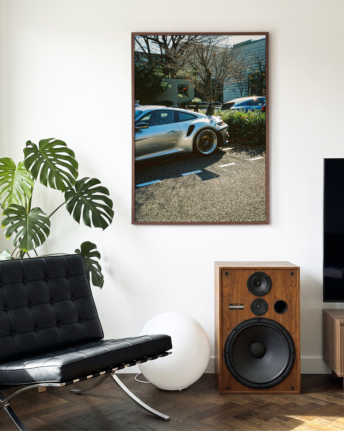 Andreezy 17 minimalist car photography print in a walnut frame on a wall