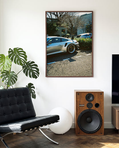 Andreezy 17 minimalist car photography print in a walnut frame on a wall