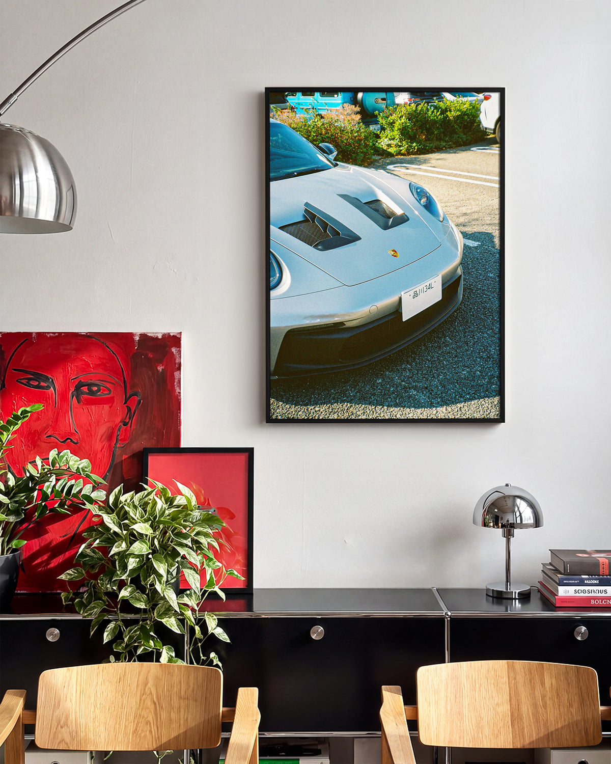 Andreezy 19 minimalist JDM car photography print in a black frame on a wall
