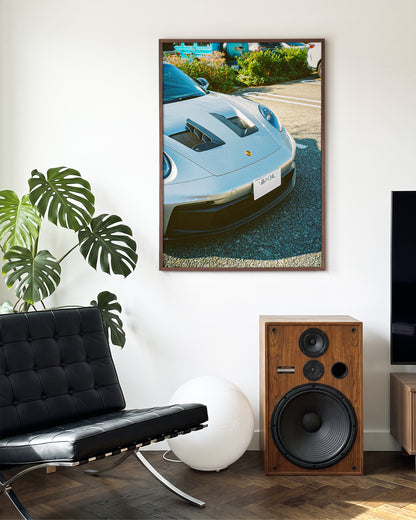 Andreezy 19 minimalist JDM car photography print in a walnut frame on a wall
