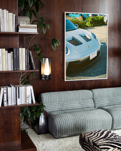 Andreezy 19 minimalist JDM car photography print in a white frame on a wall