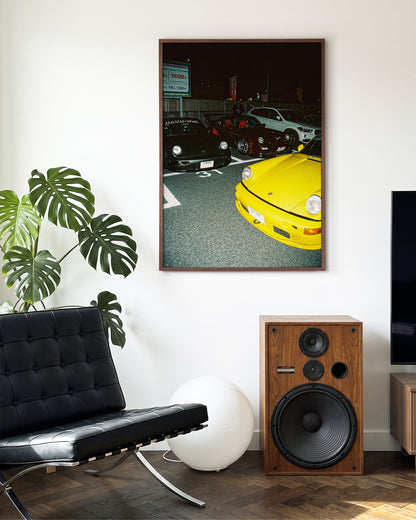 Andreezy 21 bold JDM car photography print in a walnut frame on a wall