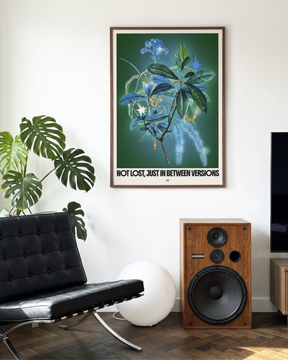 Between versions retro quote collage print in a walnut frame on a wall