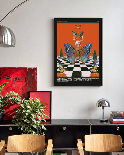 Butterfly psychedelic pop art collage print in a black frame on a wall