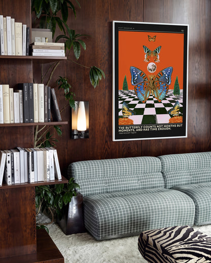 Butterfly psychedelic pop art collage print in a white frame on a wall