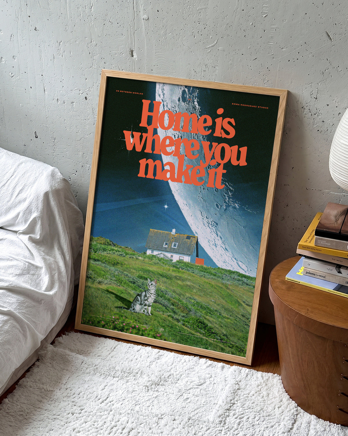 Between worlds retro space collage print in an oak frame on a wall