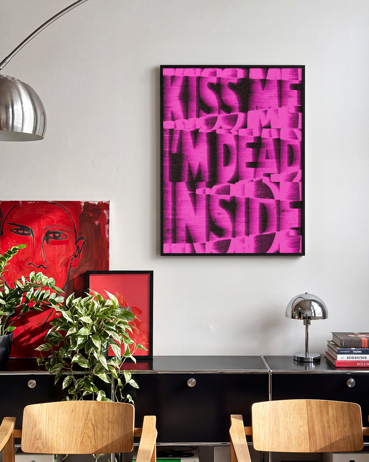 Kiss Me I'm Dead Inside funny quote poster in a black frame on a wall