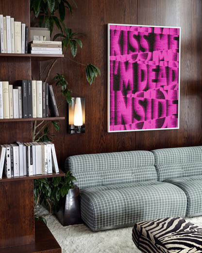 Kiss Me I'm Dead Inside funny quote poster in a white frame on a wall