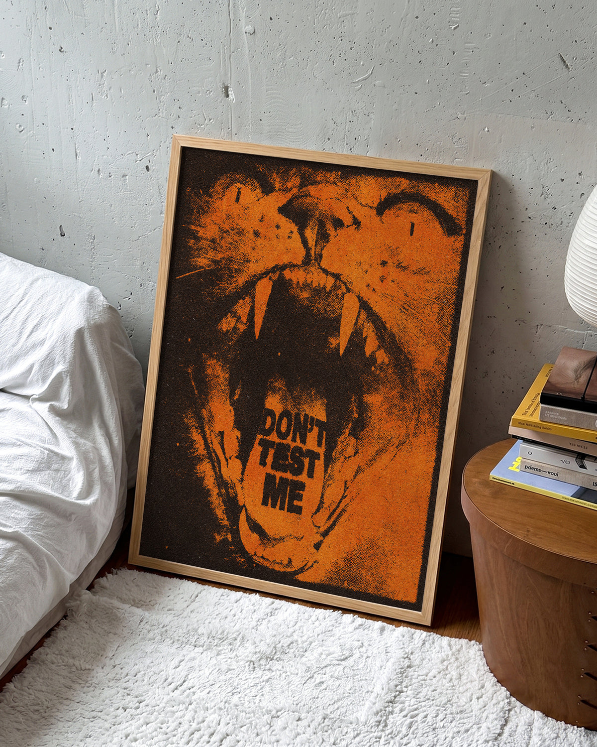 Don't Test Me bold quote poster in an oak frame on a wall