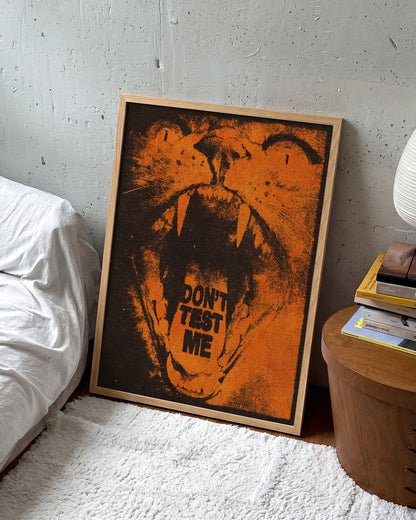 Don't Test Me bold quote poster in an oak frame on a wall