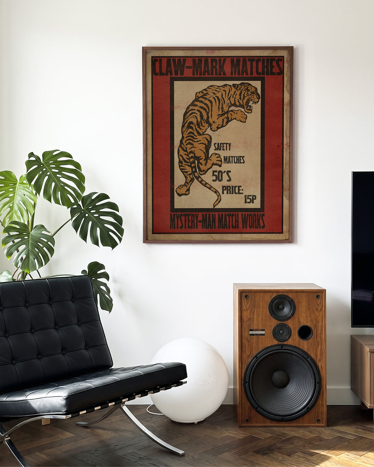 Claw Mark Matches vintage matchbox art print in a walnut frame on a wall